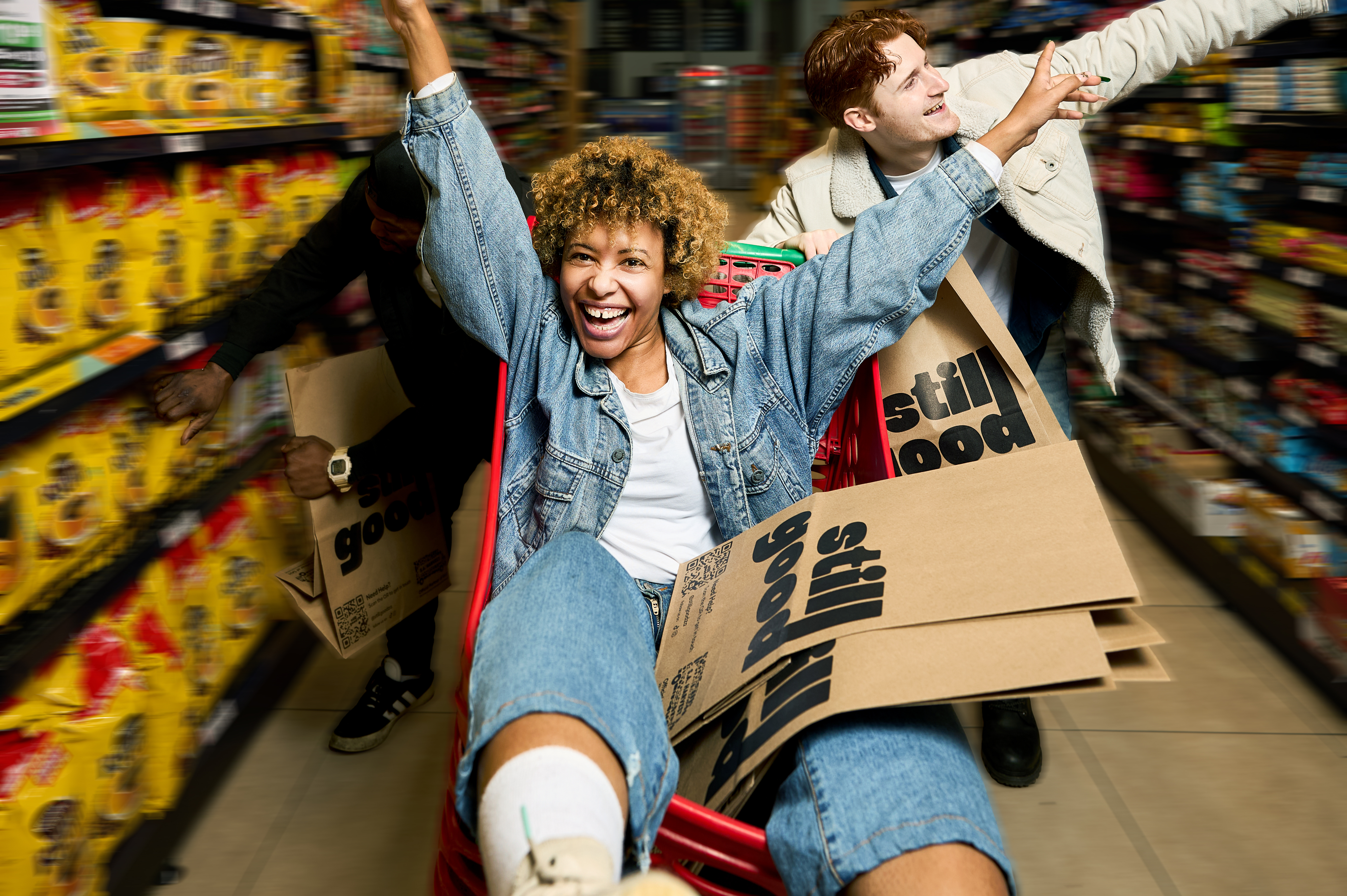 Person at standing desk working on laptop