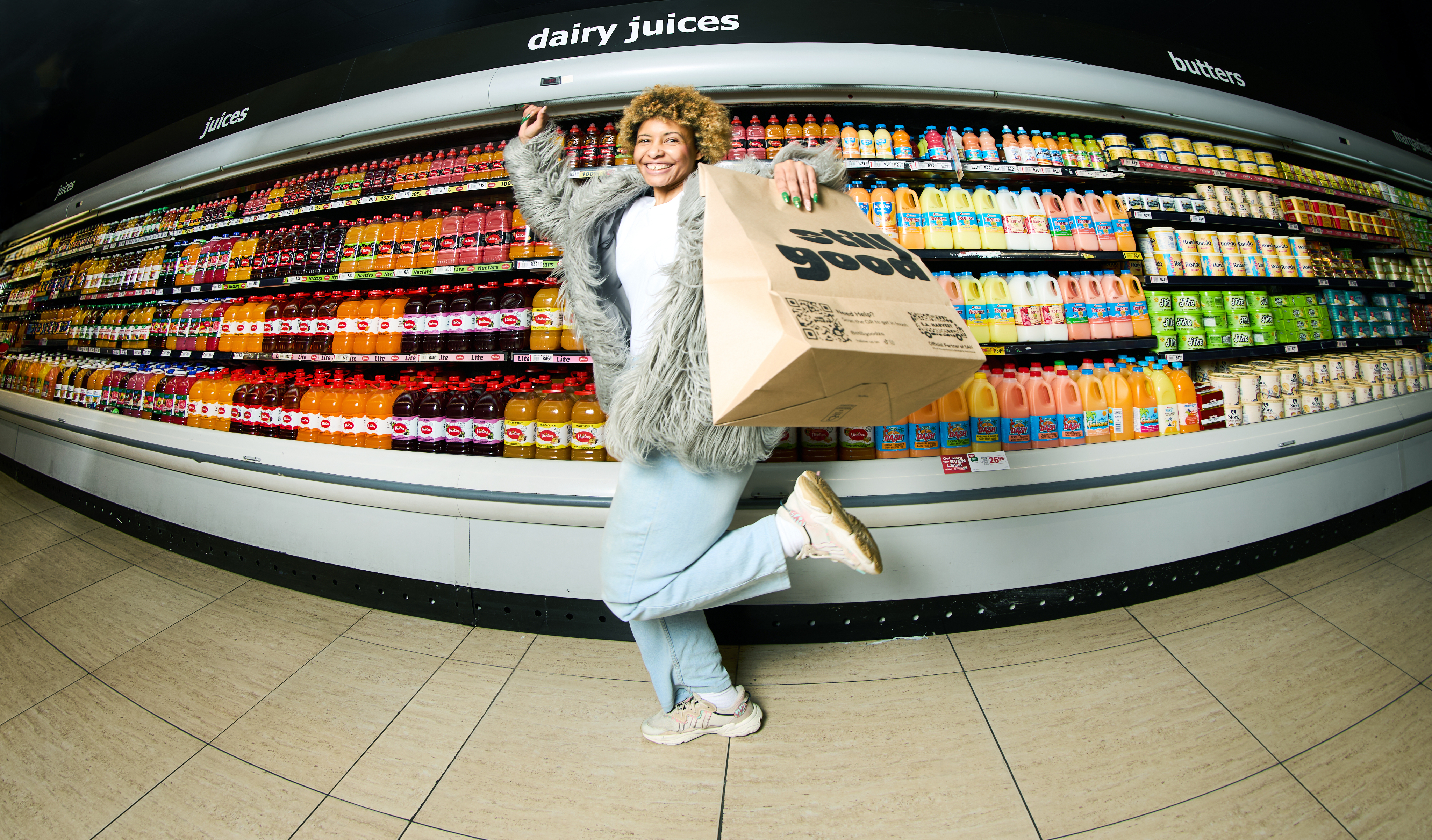 Person sitting on couch working on laptop